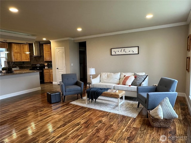 living area featuring dark wood finished floors, recessed lighting, baseboards, and ornamental molding