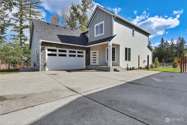 view of front of property featuring a garage