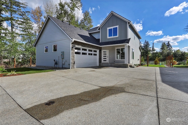 view of front of home with a garage