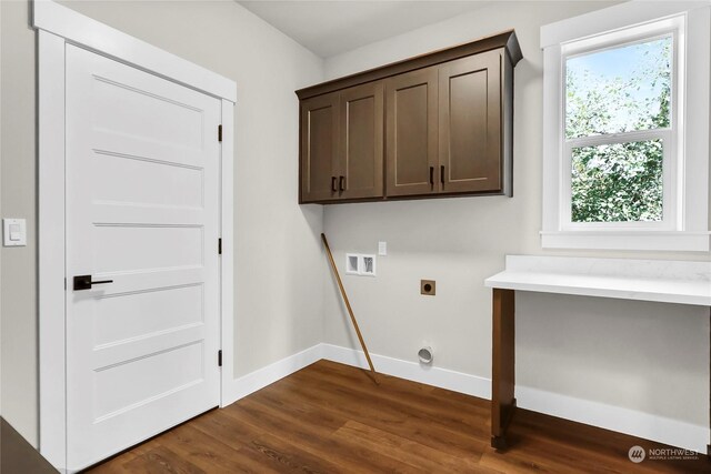 laundry room with washer hookup, cabinets, dark hardwood / wood-style flooring, and electric dryer hookup