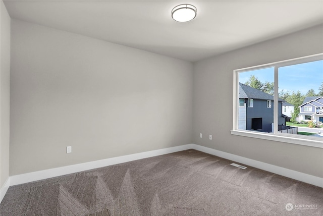 7510 172nd Street Ct E, Puyallup, WA 98375 - carpeted spare room featuring baseboards