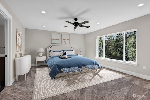 bedroom with ceiling fan and carpet