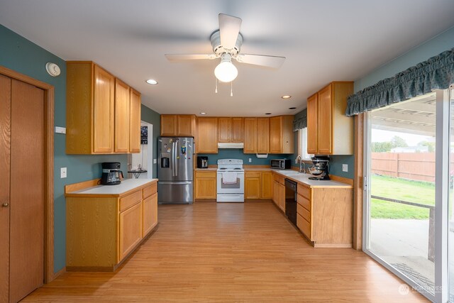 kitchen with dishwasher, sink, stainless steel refrigerator with ice dispenser, light hardwood / wood-style flooring, and electric range