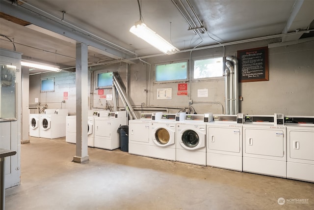 laundry room with washing machine and clothes dryer