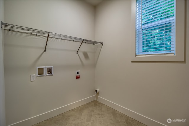 washroom with washer hookup and hookup for an electric dryer