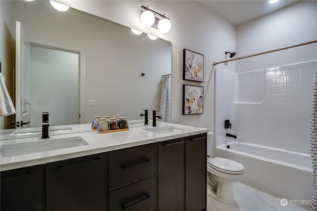 full bathroom featuring  shower combination, vanity, and toilet