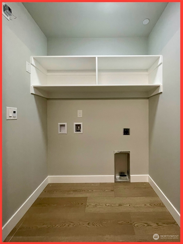 laundry room with hookup for a washing machine, wood-type flooring, and hookup for an electric dryer