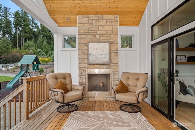 exterior space featuring an outdoor stone fireplace