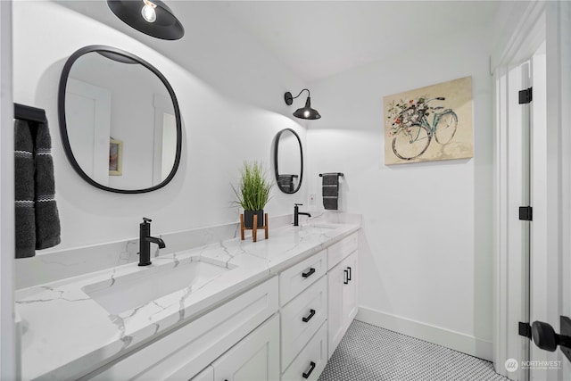 bathroom with vanity and tile patterned flooring