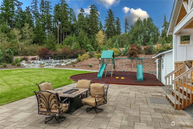 view of patio featuring a playground