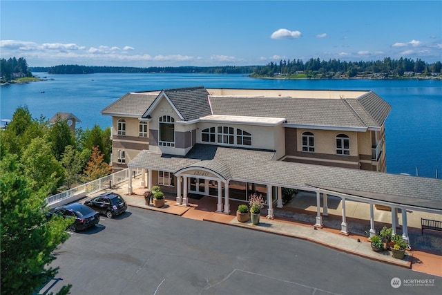 exterior space with a water view