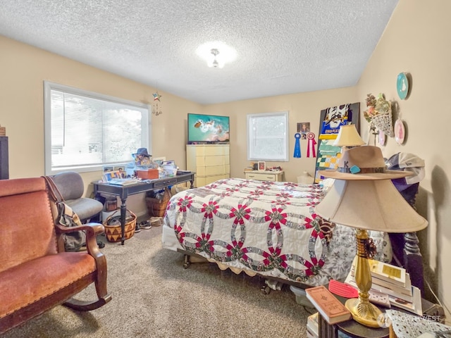 carpeted bedroom featuring a textured ceiling