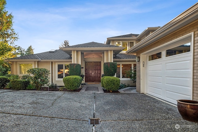 view of front of house with a garage