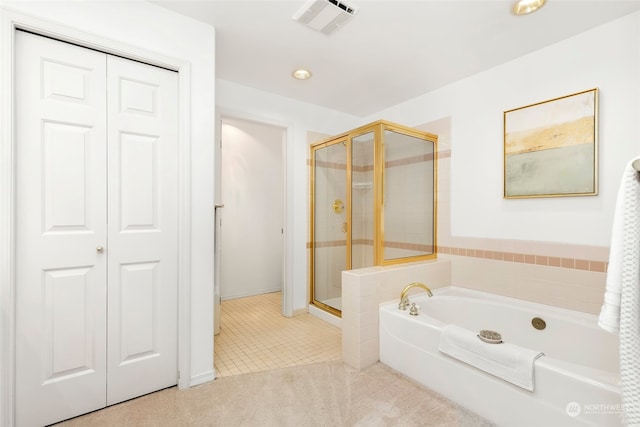 bathroom with tile patterned flooring and plus walk in shower