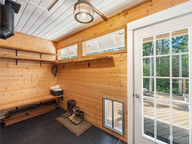 workout room with wood walls