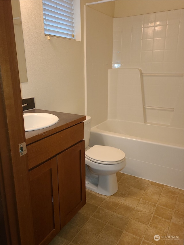 full bathroom with tub / shower combination, vanity, and toilet