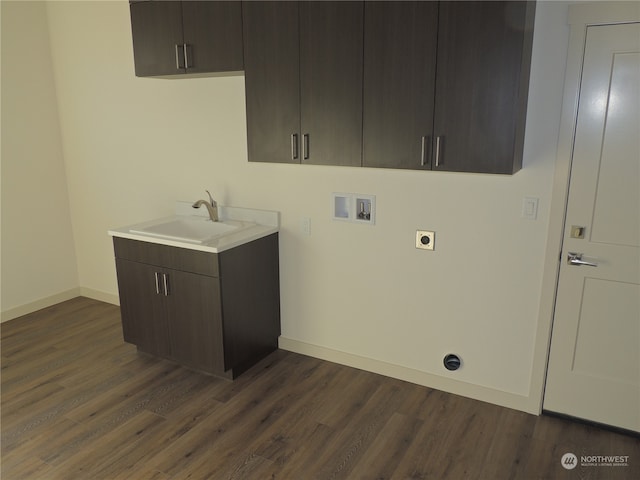 laundry room with washer hookup, cabinets, dark wood-type flooring, sink, and electric dryer hookup