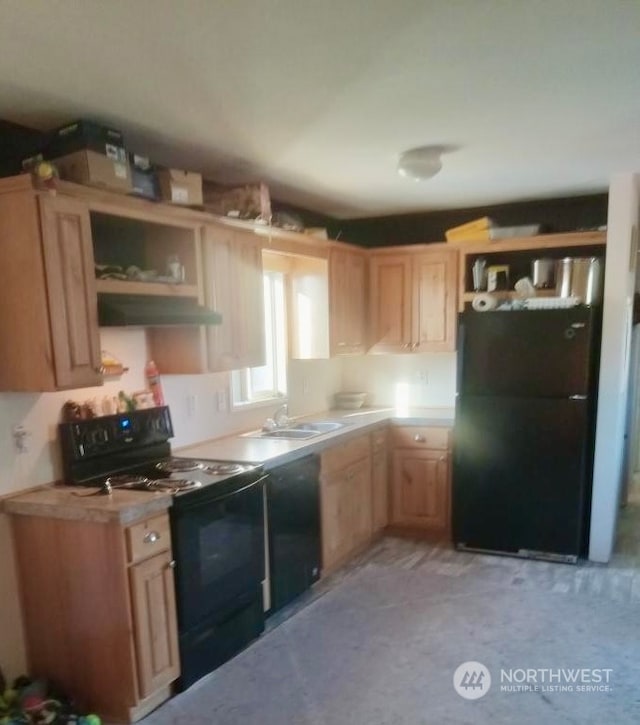 kitchen featuring ventilation hood, light brown cabinetry, sink, and black appliances