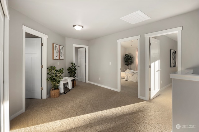 hallway with carpet