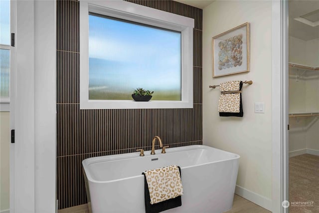 bathroom with a washtub