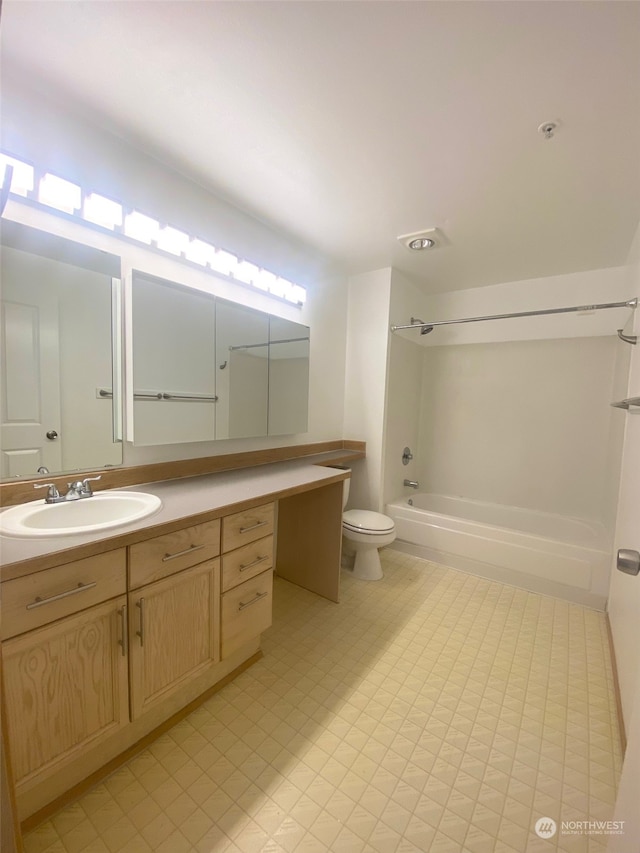 full bathroom with vanity, toilet, and shower / bathtub combination