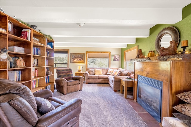 tiled living room featuring beamed ceiling