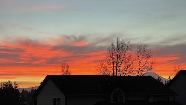 view of property exterior at dusk