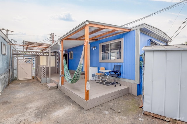 exterior space featuring a wooden deck