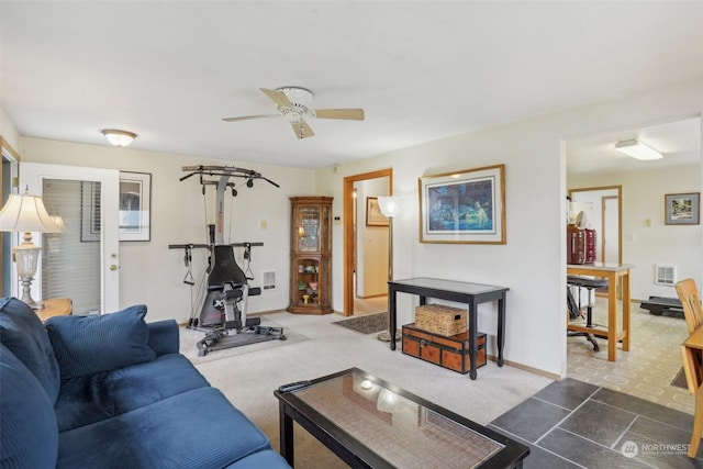 6439 S Clement Ave, Tacoma, WA 98409 - living room with carpet, baseboards, a ceiling fan, and visible vents