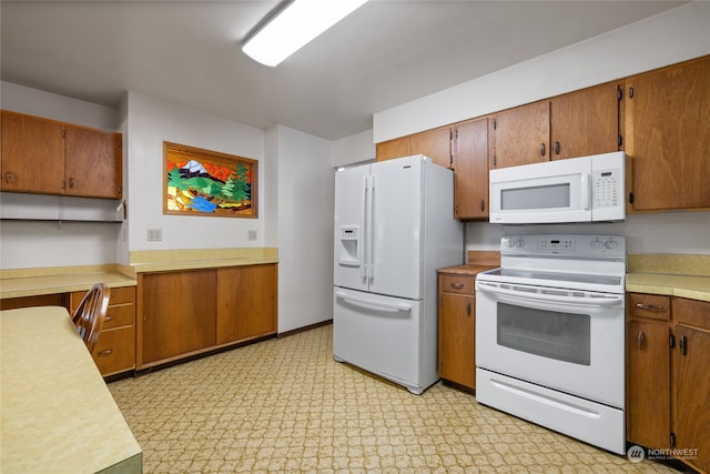 kitchen featuring white appliances