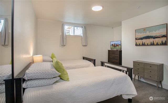 bedroom with concrete floors