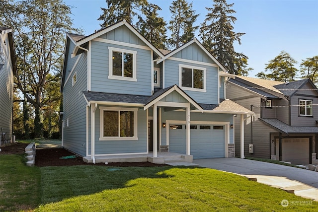 view of front facade featuring a garage and a front lawn