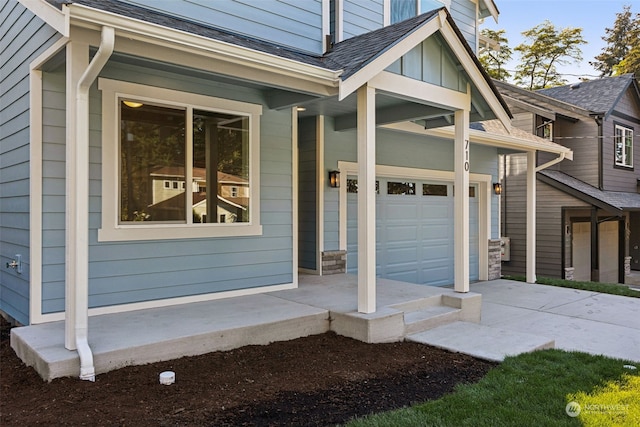 property entrance featuring a garage