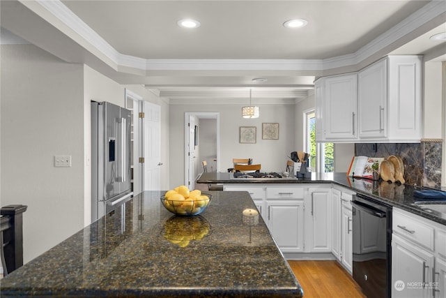 kitchen with high end refrigerator, dark stone countertops, white cabinetry, black dishwasher, and crown molding