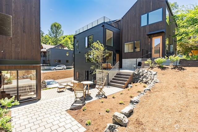 view of front facade featuring a patio area