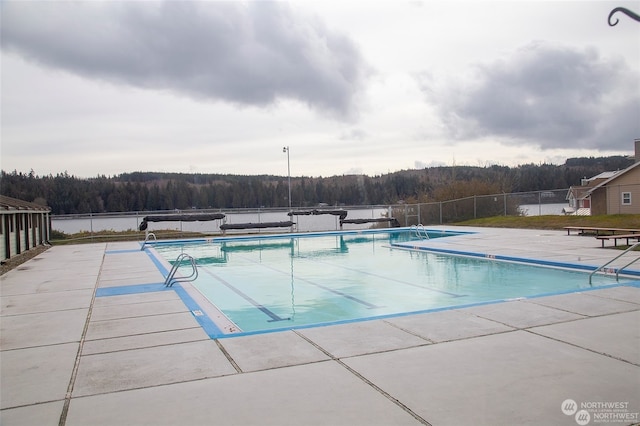 view of pool featuring a patio area