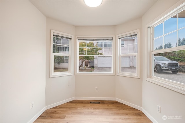 empty room featuring light hardwood / wood-style floors