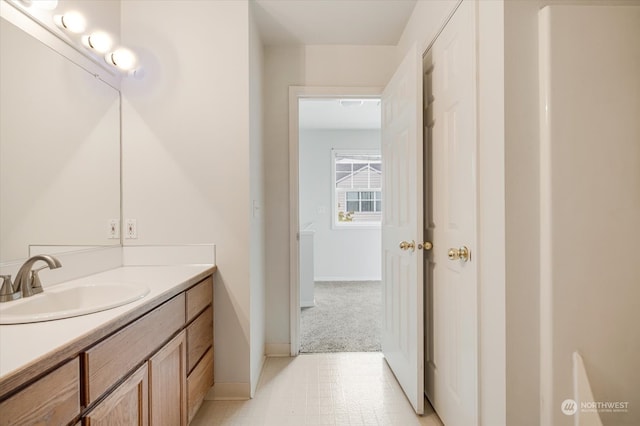 bathroom featuring vanity and tile patterned flooring