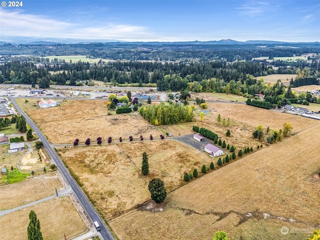 birds eye view of property featuring a rural view