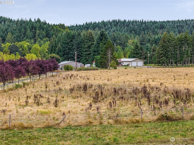 view of landscape featuring a rural view