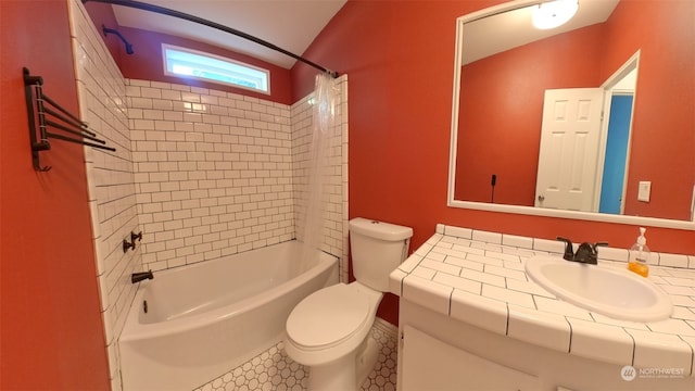 full bathroom with vanity, shower / tub combo, and toilet