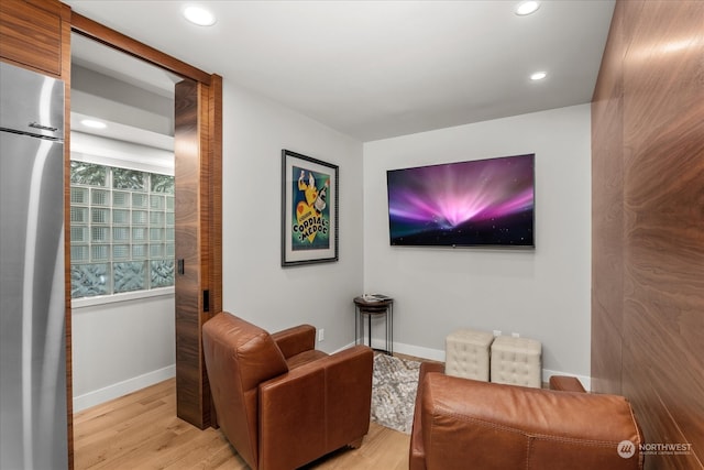 living area featuring light hardwood / wood-style floors