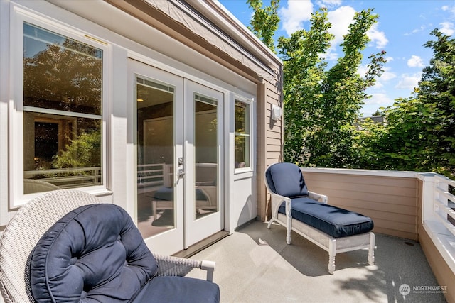 exterior space featuring french doors and a balcony