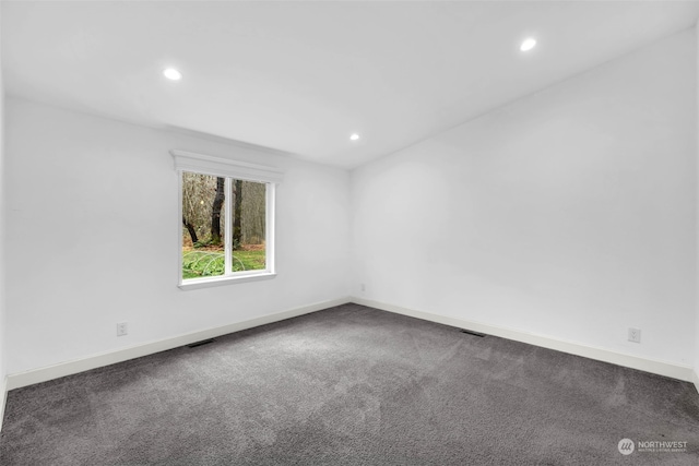 view of carpeted spare room