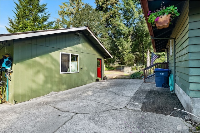 view of property exterior with a patio