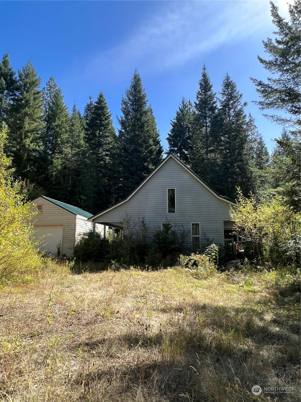 135 Burnt Fork Ln, Dayton, WA 99328 - view of side of property with an outdoor structure and a garage