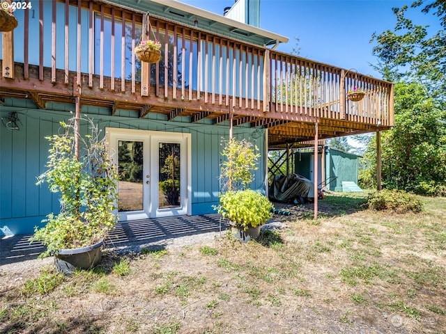 rear view of property featuring a deck