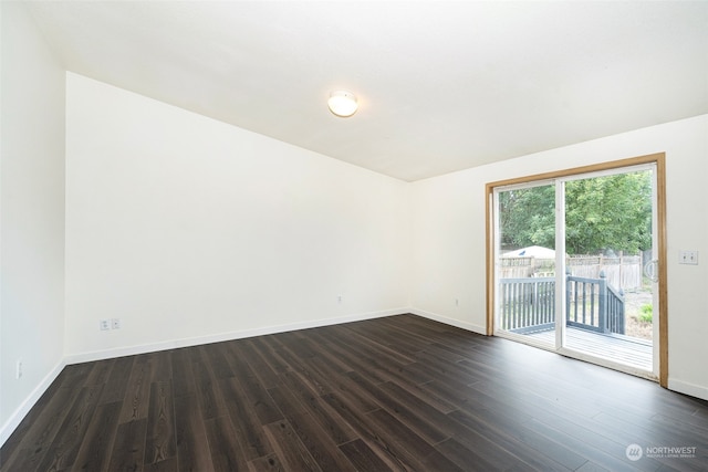 empty room featuring dark hardwood / wood-style floors