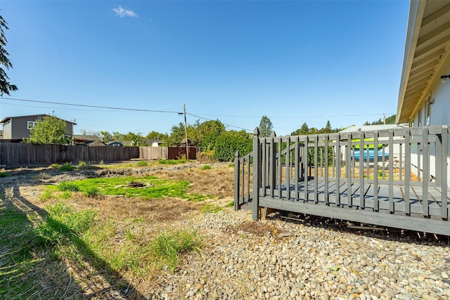 view of yard featuring a deck