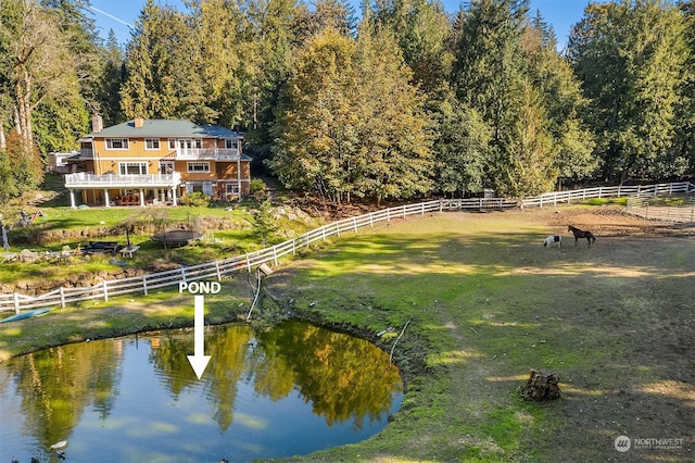 exterior space featuring a water view and a rural view